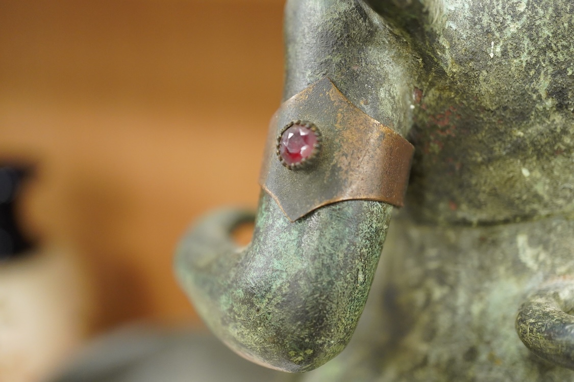 After the antique, an early 20th century bronze figure Winged Victory, on associated base, 60cm high